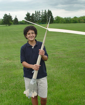 Chris Erler and his Sewickley Academy's sixth grade Earth Science class folding prop helicopter